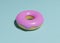 Raspberry pastry donut on a turquoise background. 3d rendering, calories