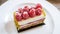 Raspberry and pistachio cheesecake