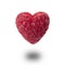 Raspberry in the shape of a heart on a white background