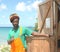 Rasta craftsman on beach Carriacou Grenada