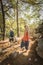 Rastafarian girl on a walk in a rocky forest