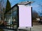 raster collage of bus shelter with white poster ad display