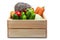 Rat on a box with vegetables. White isolated background. Symbol Year of the Rat. Cute pet