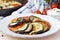 Ratatouille, vegetables cut on slices, eggplant, zucchini