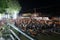 Ratchaburi,Thailand - October 29,2016 : Blurred focus of Thai people waiting sing the anthem and hold the candles on the boat pray