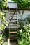 rather steep stairway up to the second level of the garden, wine roof