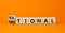 Rational or emotional symbol. Turned wooden cubes and changed the word `rational` to `emotional`. Beautiful orange background.