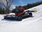 Ratrak, snow grooming machine on a sunny spring day at Saint Sauveur, Quebec