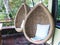 Rattan lounge hanging chair whit white pillow.rattan lounge hang