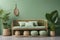 Rattan sofa with light green cushions, wicker basket and big plants against green wall with shelf. Scandinavian interior