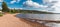 Rattvik, Dalarna - Sweden - Group of young people at a camping on the sandy beach of the Siljan lake