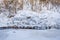 Raunas staburags, snow and ice. River is frozzen.