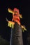 Ravan Ravana effigy standing against night sky on dussera