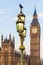 Raven on lampost at Houses of Parliament in early winter morning