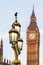 Raven on lampost at Houses of Parliament in early winter morning