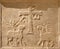RAVENNA, ITALY - JANUARY 27, 2020: The relief from old christian tomb with the cross and paradise symbolic in the church
