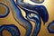 Ravishing blue and golden acrylic liquid ink swirl abstract background.