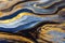 Ravishing blue and golden acrylic liquid ink swirl abstract background.