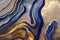 Ravishing blue and golden acrylic liquid ink swirl abstract background.