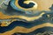 Ravishing blue and golden acrylic liquid ink swirl abstract background.