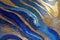 Ravishing blue and golden acrylic liquid ink swirl abstract background.