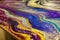 Ravishing multicolor acrylic color liquid ink swirled abstract background.