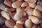 Raw almonds pile on a rustic table