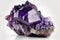 Raw amethyst purple stone from nature against white background