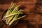 Raw asparagus. Wooden background. Place for text. View from above