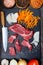 Raw beef cut into slices and vegetables prepared for cooking. View from above