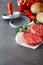 Raw Beef Hamburger Patties with Press and Rolls