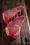 Raw beef marbled steak with vintage background