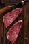 Raw beef marbled steak with vintage background