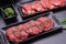 Raw beef slice for barbecue japanese style, yakiniku, meat are being cooked on stove