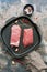 Raw beef tenderloin with spices in a frying pan for cooking. Rustic background, top view, flat lay.
