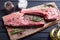 Raw beef tomahawk steak