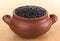 Raw Black Beans in Rustic Bowl