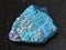 raw blue Chalcopyrite stone on dark background