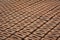 Raw brick laid out in stacks for drying.