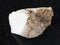 raw cacholong (white opal) stone on dark