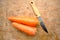 Raw carrot and knife