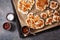 Raw cauliflower steaks with spice on baking tray. plant based meat substitute