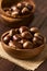 Raw Chestnuts in Wooden Bowl