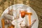 Raw chicken from above on straw table, vivid lightning