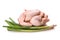 Raw chicken and a bunch of green onions. Isolate on white background