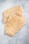 Raw chicken schnitzel Escalope in breadcrumbs. White background. Top view