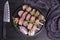 Raw chicken skewers with tomatoes and vegetables. Kebab. On a wooden background. Top view. Copy space