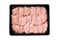 Raw chicken thighs boneless Skinless in packaging tray.Lots of Chunks of Fresh Skinless Chicken Thigh in a Plastic Supermarket