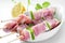 Raw chicken and vegetables skewers