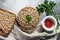 Raw Chickpeas in bowl. Nutritious food.  Healthy and vegetarian food. Gray background. Top view